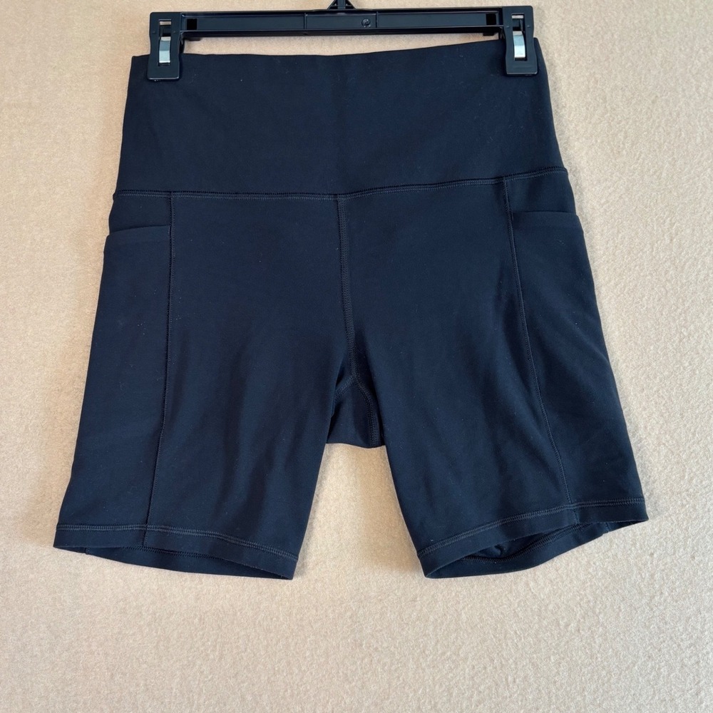 Athleta Salutation Stash Pocket II 7" Short Black High Rise Yoga Biker S 531907